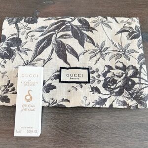 Authentic Gucci Beauty Pouch New and Gucci sample perfume.